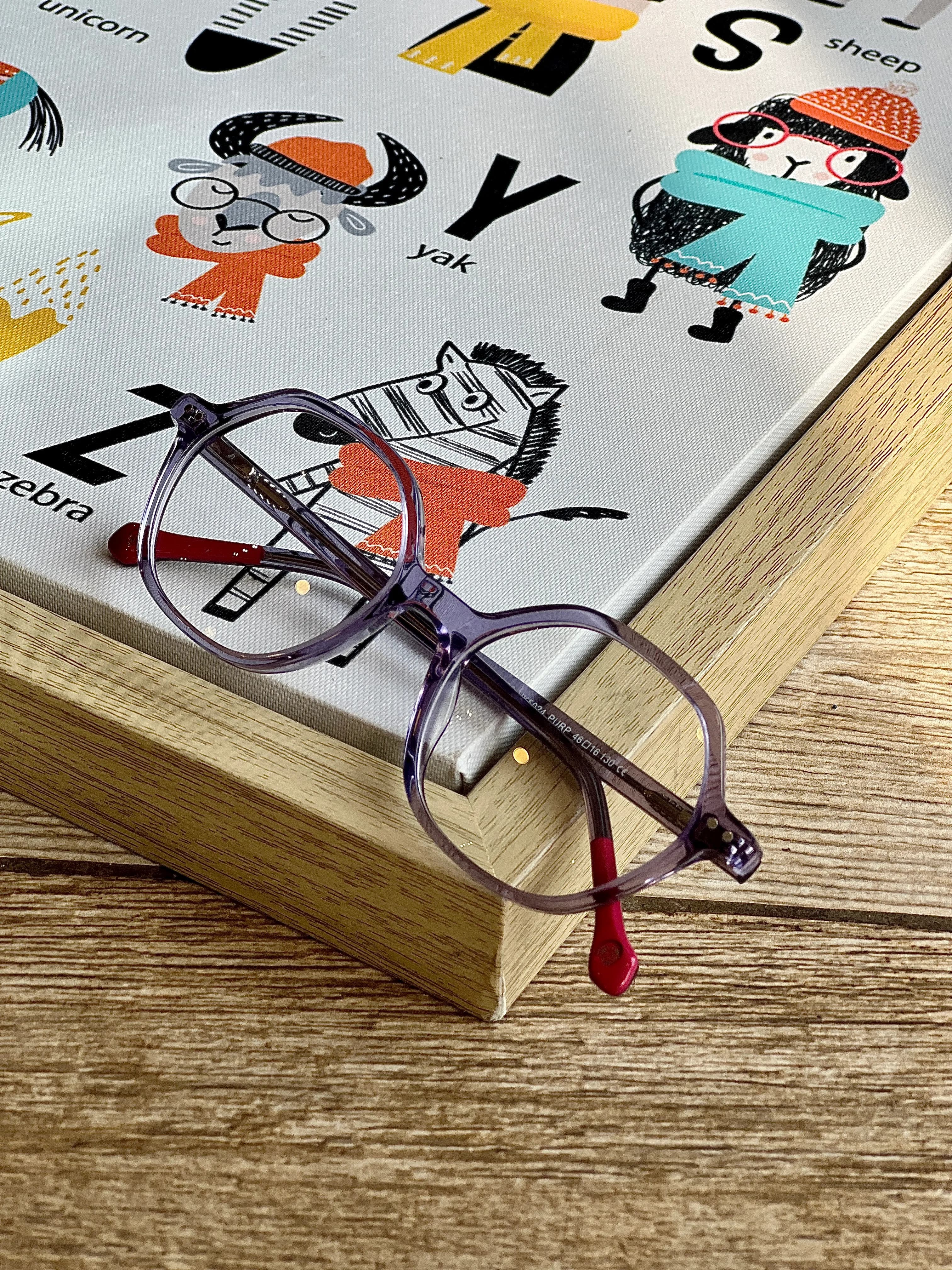 Eyewear on book