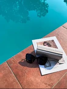 Sunglasses by the pool