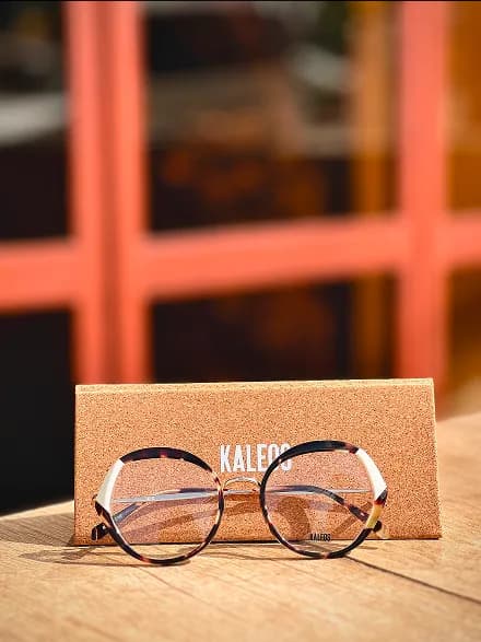 Glasses with orange background