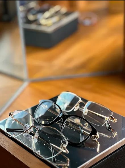 Sunglasses on red surface