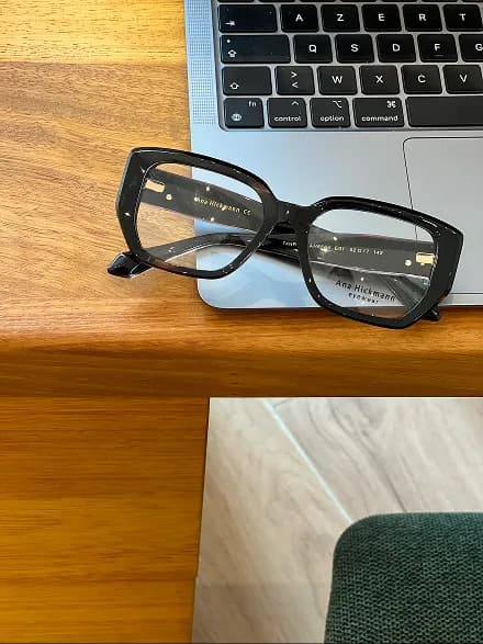 Sunglasses on red surface