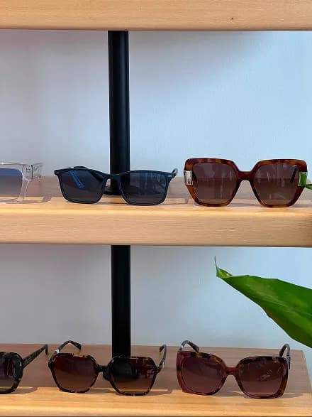 Sunglasses on red surface